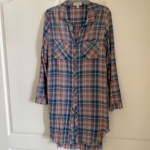 plaid shirt dress with fringe on hem and cuffs